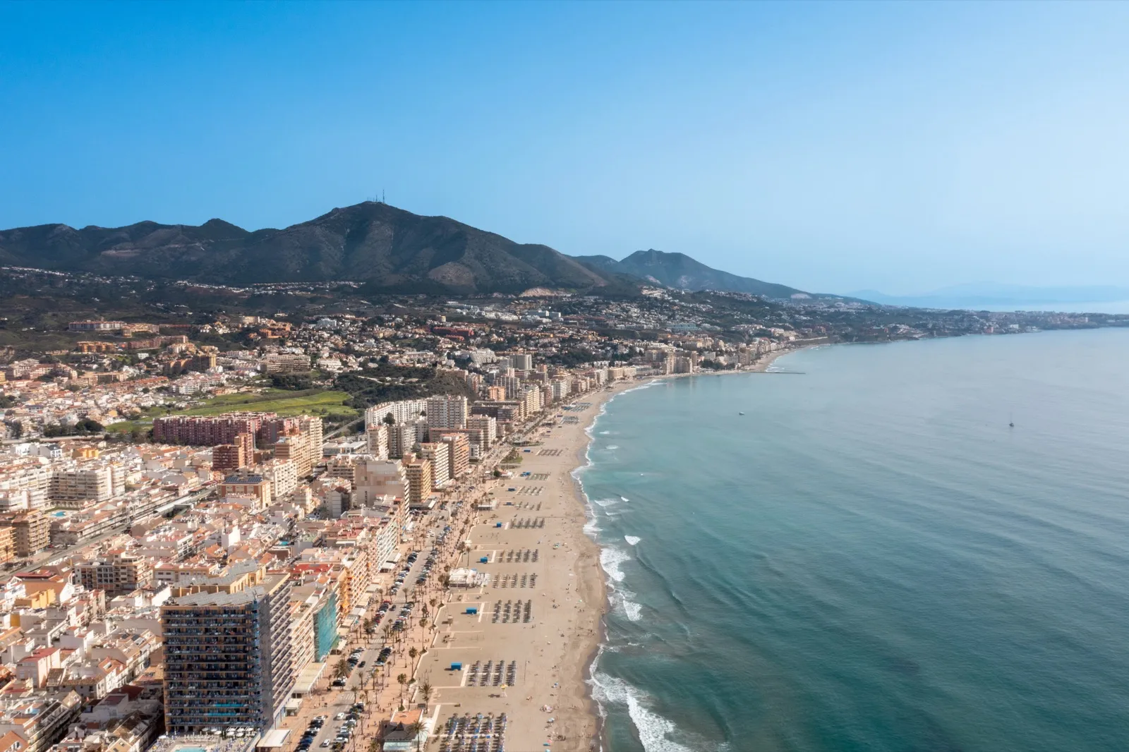 The long sandy beach and promenade at Fuengirola