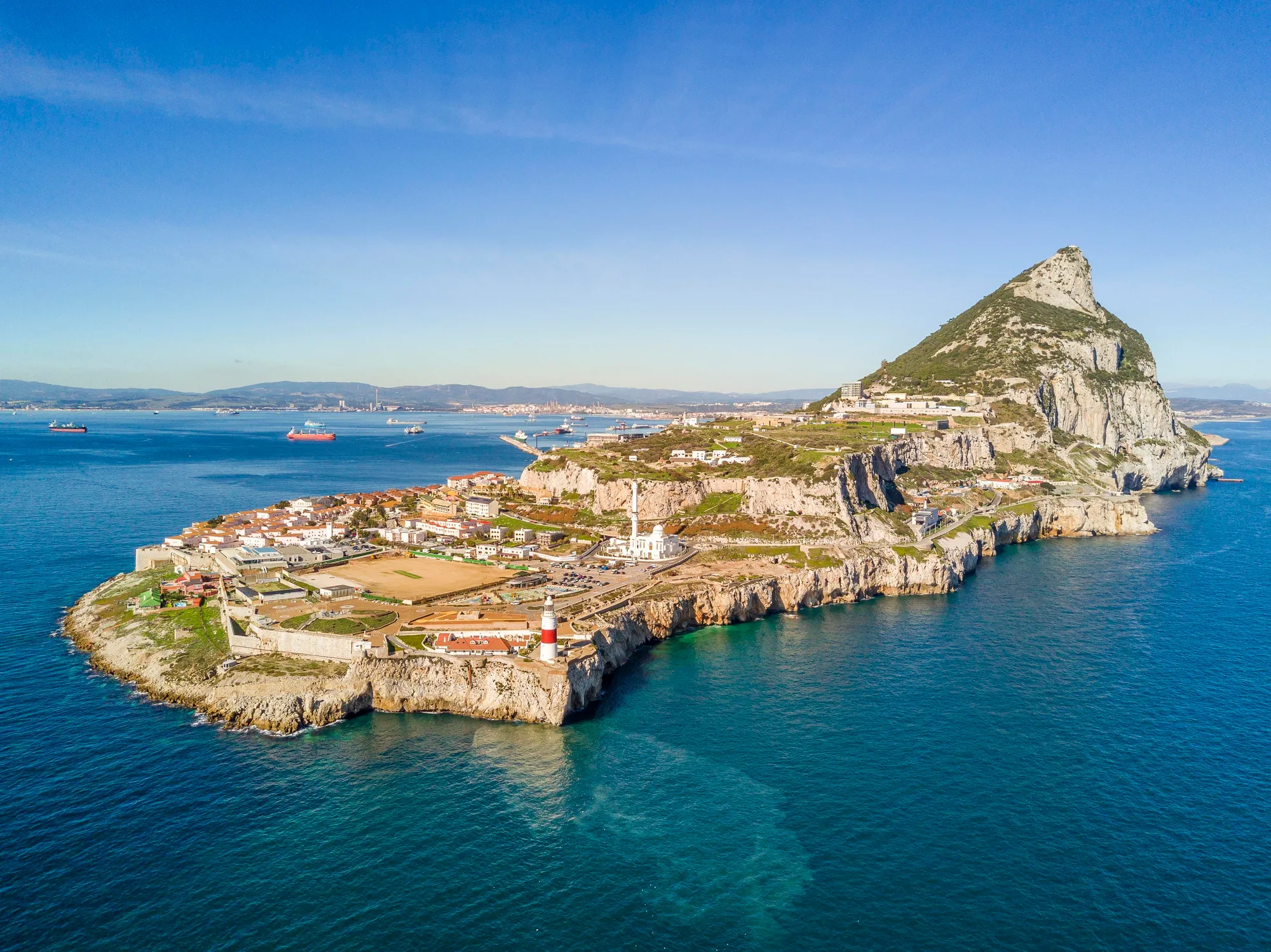 The Rock of Gibraltar rising above the town and bay