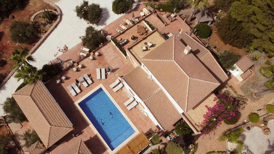 The pool and sun terrace at Finca Sonrisa from above